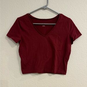 Red V-neck shirt